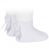 Buy Garter stitch short socks with bow WHITE in the online store Condor. Made in Spain. Visit the PERLE BABY SOCKS section where you will find more colors and products that you will surely fall in love with. We invite you to take a look around our online store.