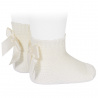 Buy Garter stitch short socks with bow BEIGE in the online store Condor. Made in Spain. Visit the PERLE BABY SOCKS section where you will find more colors and products that you will surely fall in love with. We invite you to take a look around our online store.