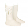 Buy Knee-high socks with grossgrain side bow BEIGE in the online store Condor. Made in Spain. Visit the GROSGRAIN BOW SOCKS section where you will find more colors and products that you will surely fall in love with. We invite you to take a look around our online store.