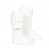 Buy Perle knee high socks with pompoms WHITE in the online store Condor. Made in Spain. Visit the POMPOM BABY SOCKS section where you will find more colors and products that you will surely fall in love with. We invite you to take a look around our online store.