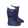 Buy Perle knee high socks with pompoms NAVY BLUE in the online store Condor. Made in Spain. Visit the POMPOM BABY SOCKS section where you will find more colors and products that you will surely fall in love with. We invite you to take a look around our online store.