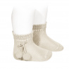 Buy Perle short socks with pompoms LINEN in the online store Condor. Made in Spain. Visit the POMPOM BABY SOCKS section where you will find more colors and products that you will surely fall in love with. We invite you to take a look around our online store.