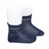 Compra Perle short socks with pompoms NAVY BLUE en la tienda online Condor. Fabricado en España. Visita la sección POMPOM BABY SOCKS donde encontrarás más colores y productos que seguro que te enamorarán. Te invitamos a darte una vuelta por nuestra tienda online.