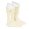 Buy Side openwork perle knee high socks withpompom BEIGE in the online store Condor. Made in Spain. Visit the POMPOM BABY SOCKS section where you will find more colors and products that you will surely fall in love with. We invite you to take a look around our online store.