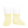 Buy Perle side openwork short socks BUTTER in the online store Condor. Made in Spain. Visit the BABY SPIKE OPENWORK SOCKS section where you will find more colors and products that you will surely fall in love with. We invite you to take a look around our online store.
