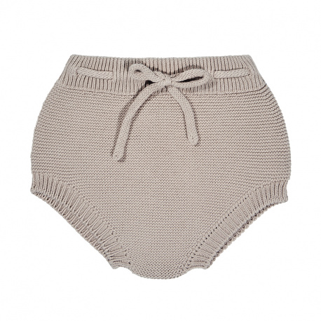 Buy the Garter stitch culotte with cord STONE made of 100% cotton. Exclusive panty-type shorts from our collection for newborns. Available in a wide variety of colors that match Condor tights, baby tights, socks, with cardigans. Available for babies, both for boys and girls. They are unisex. Very comfortable and high quality Condor. Within Culotte garter stitch, you will also find other types of baby clothing.