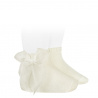 Buy Ceremony short socks with organza bow BEIGE in the online store Condor. Made in Spain. Visit the LACE AND TULLE SOCKS section where you will find more colors and products that you will surely fall in love with. We invite you to take a look around our online store.