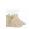 Buy Ceremony short socks with organza bow LINEN in the online store Condor. Made in Spain. Visit the LACE AND TULLE SOCKS section where you will find more colors and products that you will surely fall in love with. We invite you to take a look around our online store.