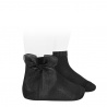 Buy Ceremony short socks with organza bow BLACK in the online store Condor. Made in Spain. Visit the LACE AND TULLE SOCKS section where you will find more colors and products that you will surely fall in love with. We invite you to take a look around our online store.