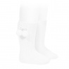 Buy Warm cotton rib knee-high socks with pompoms WHITE in the online store Condor. Made in Spain. Visit the POMPOM WARM BABY SOCKS section where you will find more colors and products that you will surely fall in love with. We invite you to take a look around our online store.