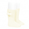 Buy Warm cotton rib knee-high socks with pompoms BEIGE in the online store Condor. Made in Spain. Visit the POMPOM WARM BABY SOCKS section where you will find more colors and products that you will surely fall in love with. We invite you to take a look around our online store.