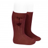 Buy Warm cotton rib knee-high socks with pompoms BURGUNDY in the online store Condor. Made in Spain. Visit the POMPOM WARM BABY SOCKS section where you will find more colors and products that you will surely fall in love with. We invite you to take a look around our online store.