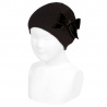 Buy Garter stitch knit hat with big velvet bow BLACK in the online store Condor. Made in Spain. Visit the ACCESSORIES FOR KIDS section where you will find more colors and products that you will surely fall in love with. We invite you to take a look around our online store.