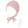 Buy the Garter sttich classic bonnet PALE PINK made of 100% cotton. Available in a wide variety of colors that match the Condor tights, socks, long cardigans and short cardigan jackets, boleros for girls. Available for babies, both for boys and girls. They are unisex. Discover more models in the BONNETS section.