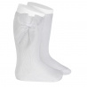 Buy Knee high socks with organza bow WHITE in the online store Condor. Made in Spain. Visit the LACE AND TULLE SOCKS section where you will find more colors and products that you will surely fall in love with. We invite you to take a look around our online store.