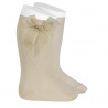 Buy Knee high socks with organza bow LINEN in the online store Condor. Made in Spain. Visit the LACE AND TULLE SOCKS section where you will find more colors and products that you will surely fall in love with. We invite you to take a look around our online store.