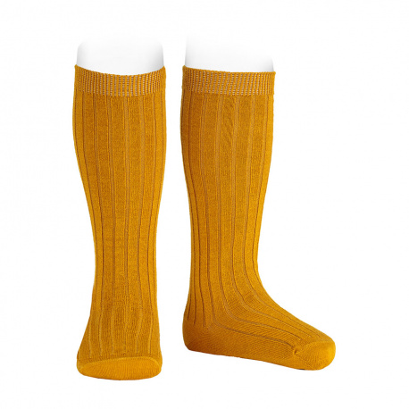 Buy Merino wool-blend rib knee socks CURRY in the online store Condor. Made in Spain. Visit the BASIC WOOL BABY SOCKS section where you will find more colors and products that you will surely fall in love with. We invite you to take a look around our online store.