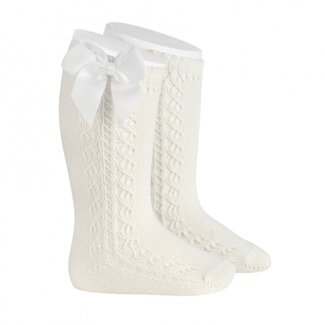 Buy Side openwork warm cotton knee socks with bow CREAM in the online store Condor. Made in Spain. Visit the WARM OPENWORK BABY SOCKS section where you will find more colors and products that you will surely fall in love with. We invite you to take a look around our online store.