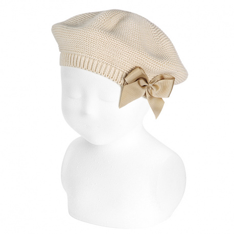 Buy Garter stitch beret with grossgrain bow LINEN in the online store Condor. Made in Spain. Visit the ACCESSORIES FOR KIDS section where you will find more colors and products that you will surely fall in love with. We invite you to take a look around our online store.