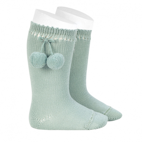 Buy Perle knee high socks with pompoms SEA MIST in the online store Condor. Made in Spain. Visit the POMPOM BABY SOCKS section where you will find more colors and products that you will surely fall in love with. We invite you to take a look around our online store.
