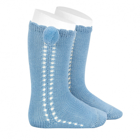 Buy Side openwork perle knee high socks withpompom BLUISH in the online store Condor. Made in Spain. Visit the POMPOM BABY SOCKS section where you will find more colors and products that you will surely fall in love with. We invite you to take a look around our online store.