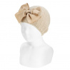 Buy Garter stitch knit hat with giant bow LINEN in the online store Condor. Made in Spain. Visit the ACCESSORIES FOR KIDS section where you will find more colors and products that you will surely fall in love with. We invite you to take a look around our online store.