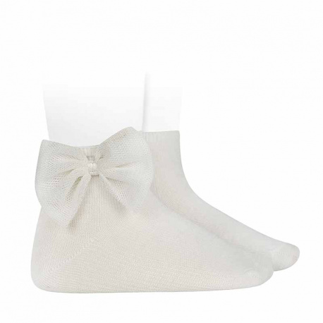 Buy Ankle socks with tulle bow CREAM in the online store Condor. Made in Spain. Visit the LACE AND TULLE SOCKS section where you will find more colors and products that you will surely fall in love with. We invite you to take a look around our online store.