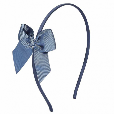 Buy Tthin headband with grosgrain bow FRENCH BLUE in the online store Condor. Made in Spain. Visit the HAIR ACCESSORIES section where you will find more colors and products that you will surely fall in love with. We invite you to take a look around our online store.