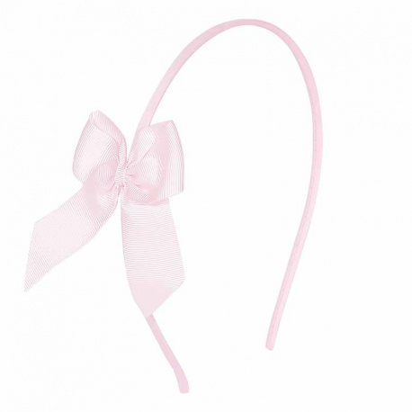 Buy Tthin headband with grosgrain bow PINK in the online store Condor. Made in Spain. Visit the HAIR ACCESSORIES section where you will find more colors and products that you will surely fall in love with. We invite you to take a look around our online store.