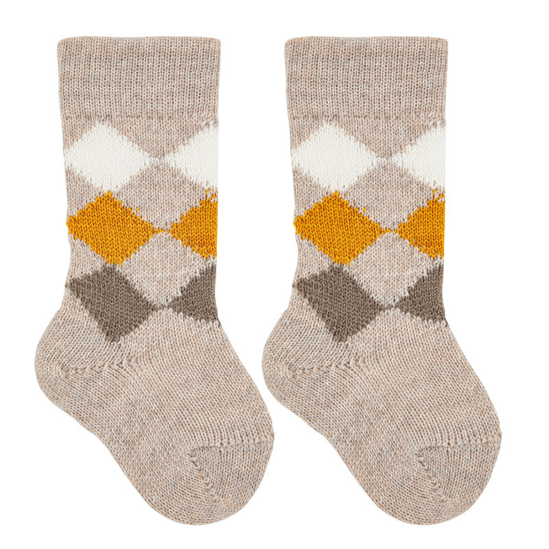 Buy Merino wool-blend diamond knee socks NOUGAT in the online store Condor. Made in Spain. Visit the FANCY BABY SOCKS section where you will find more colors and products that you will surely fall in love with. We invite you to take a look around our online store.