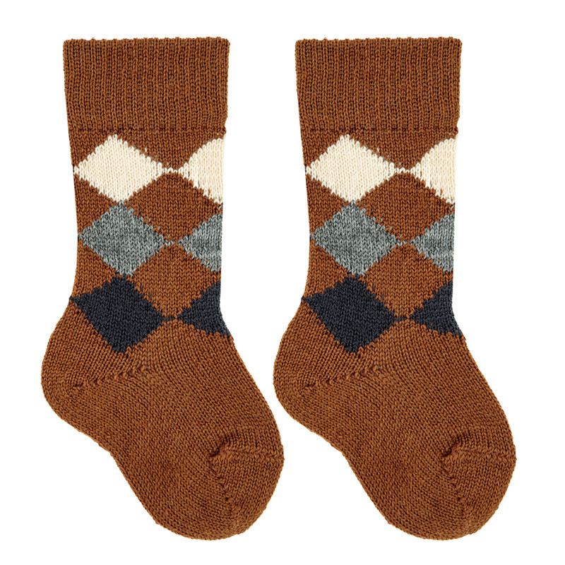 Buy Merino wool-blend diamond knee socks CHOCOLATE in the online store Condor. Made in Spain. Visit the FANCY BABY SOCKS section where you will find more colors and products that you will surely fall in love with. We invite you to take a look around our online store.