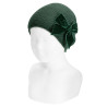 Buy Garter stitch knit hat with big velvet bow BOTTLE GREEN in the online store Condor. Made in Spain. Visit the ACCESSORIES FOR KIDS section where you will find more colors and products that you will surely fall in love with. We invite you to take a look around our online store.