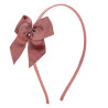 Buy Thin headband with grosgrain bow TERRACOTA in the online store Condor. Made in Spain. Visit the HAIR ACCESSORIES section where you will find more colors and products that you will surely fall in love with. We invite you to take a look around our online store.
