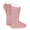 Buy Garter stitch knee high socks with bow PALE PINK in the online store Condor. Made in Spain. Visit the PERLE BABY SOCKS section where you will find more colors and products that you will surely fall in love with. We invite you to take a look around our online store.