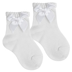 Buy Short ceremony socks with a tone-on-tonesatin bow WHITE in the online store Condor. Made in Spain. Visit the BABY CEREMONY SOCKS section where you will find more colors and products that you will surely fall in love with. We invite you to take a look around our online store.