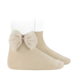 Buy Ankle socks with tulle bow LINEN in the online store Condor. Made in Spain. Visit the LACE AND TULLE SOCKS section where you will find more colors and products that you will surely fall in love with. We invite you to take a look around our online store.