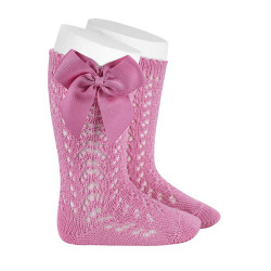 Buy Perle openwork knee-high socks with grosgrain bow CHEWING GUM in the online store Condor. Made in Spain. Visit the BABY OPENWORK SOCKS section where you will find more colors and products that you will surely fall in love with. We invite you to take a look around our online store.