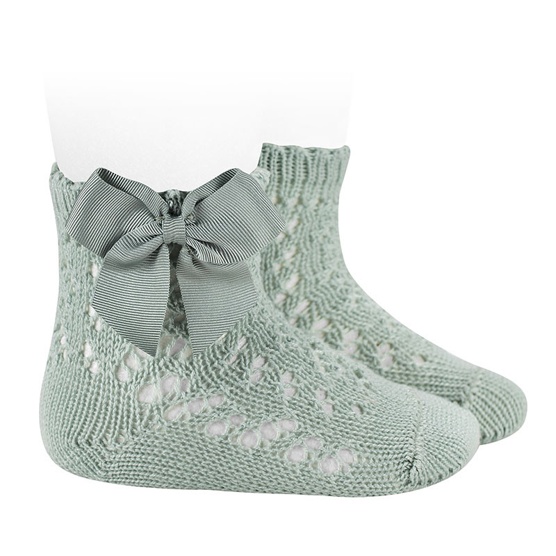 Buy Perle cotton openwork socks with grossgrain bow SEA MIST in the online store Condor. Made in Spain. Visit the BABY OPENWORK SOCKS section where you will find more colors and products that you will surely fall in love with. We invite you to take a look around our online store.