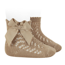 Buy Perle cotton openwork socks with grossgrain bow ROPE in the online store Condor. Made in Spain. Visit the BABY OPENWORK SOCKS section where you will find more colors and products that you will surely fall in love with. We invite you to take a look around our online store.