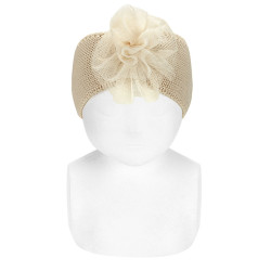 Buy Garter stitch headband with tulle flower LINEN in the online store Condor. Made in Spain. Visit the HAIR ACCESSORIES section where you will find more colors and products that you will surely fall in love with. We invite you to take a look around our online store.