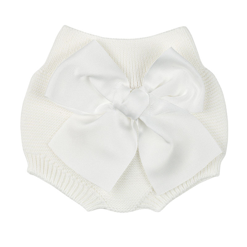Buy Garter stitch culotte with large grosgrain bow CREAM in the online store Condor. Made in Spain. Visit the GARTER STITCH COLLECTION section where you will find more colors and products that you will surely fall in love with. We invite you to take a look around our online store.