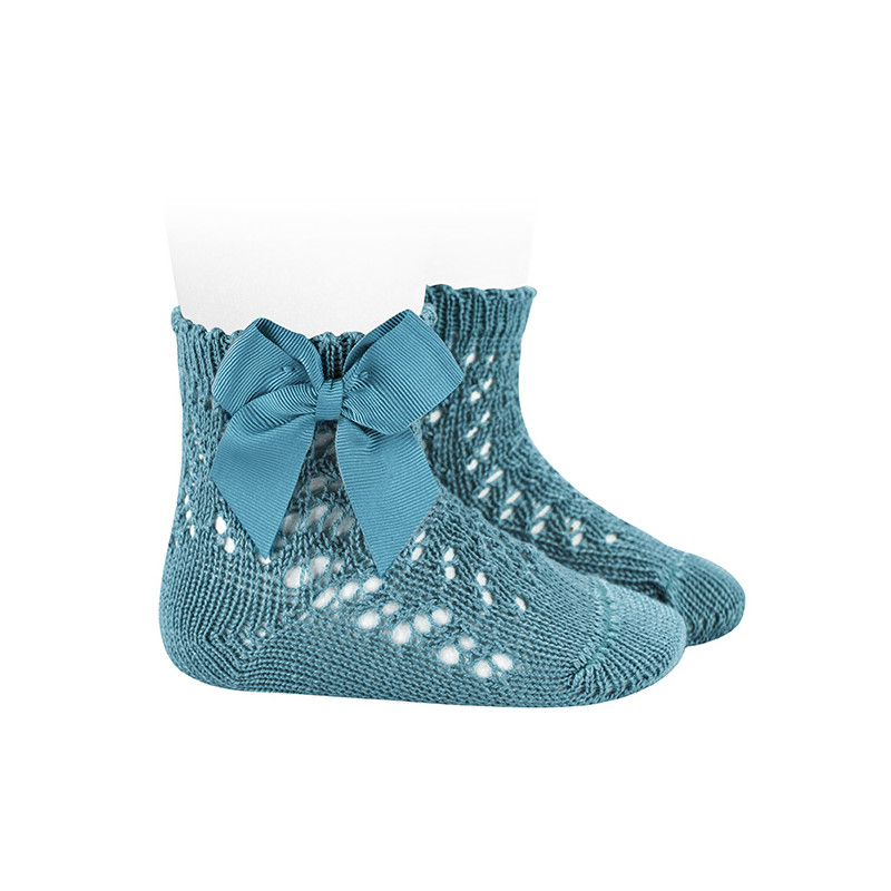 Buy Perle cotton openwork socks with grossgrain bow STONE BLUE in the online store Condor. Made in Spain. Visit the BABY OPENWORK SOCKS section where you will find more colors and products that you will surely fall in love with. We invite you to take a look around our online store.